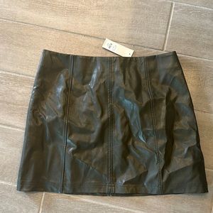 Faux leather dark green skirt! Never worn, tags still on. So cute!!!